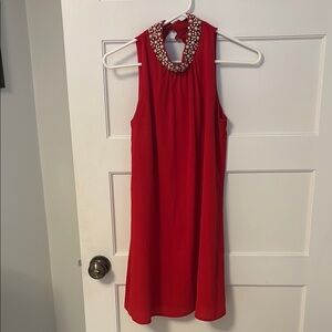 Elegant Red Sleeveless Dress with Beaded Neckline